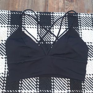 Black lululemon pushing limits sports bra